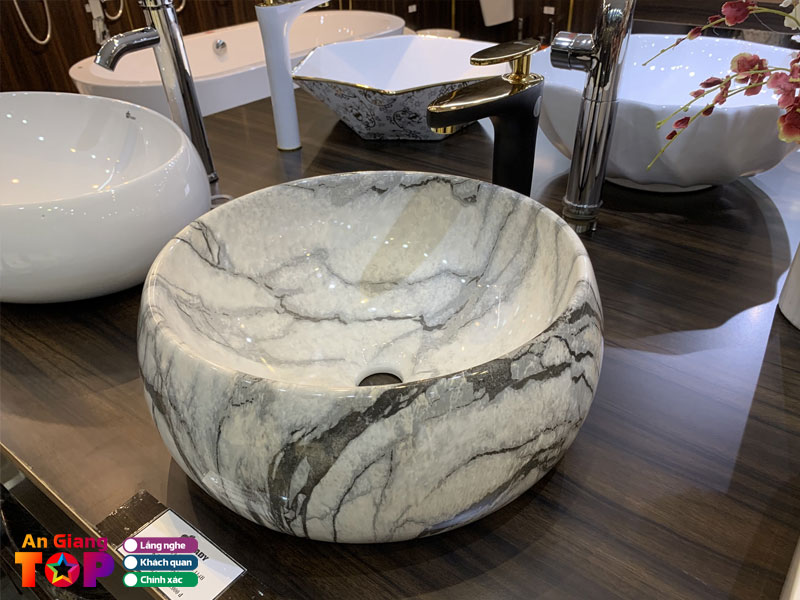 Thiet-bi-ve-sinh-tran-gia-angiangtoplist