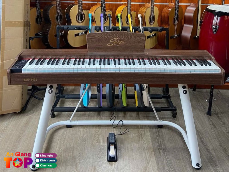 Nhac-cu-hoang-viet-angiangtoplist