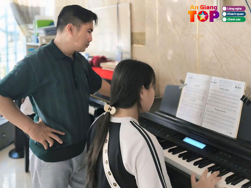 Trung-tam-day-nhac-l-music-angiangtoplist